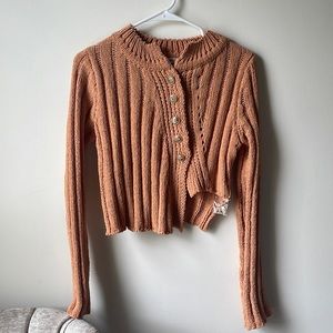 Cropped orange knit sweater. Asymmetrical front. New with tags